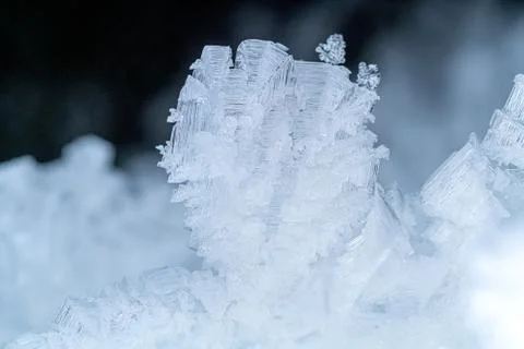Close up of snow crystals. Stock Photos