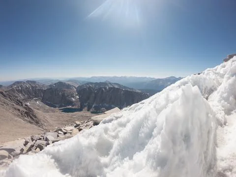 Close up of snow remnants on path to White Mountney through tops in Sierra .. Stock Photos