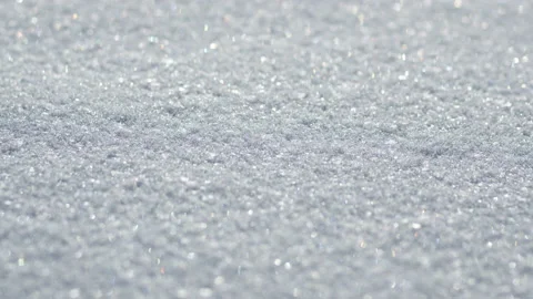Close up of snow, slow camera slide to the right, 6k Stockbeeldmateriaal 151649249