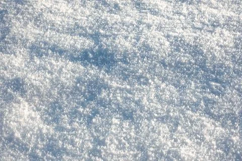 Close-up snowflakes texture. Winter background. Small depth of field. White Stock Photos
