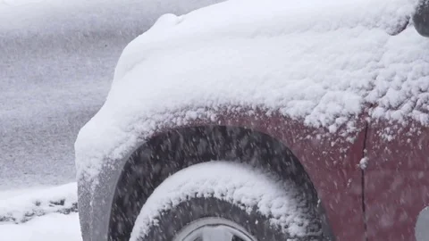 Close up snowing on car slow motion Stock Footage 73373327