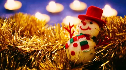 Close up of a Snowman on candles background Vídeos de archivo 44464072