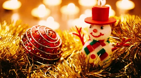Close up of a Snowman on candles background Video stock 44470738