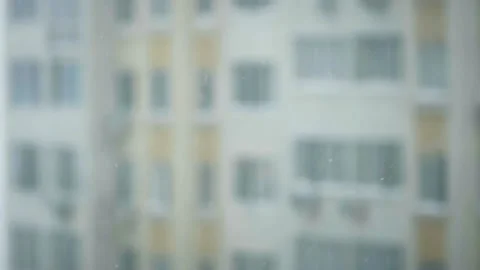 Close-up of a snowy blizzard outside the window on the background of... Stock Footage 86812132