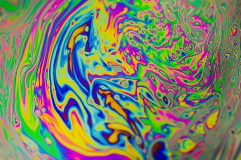 Close up soap bubble background. Psychedelic abstract background Stock Photos