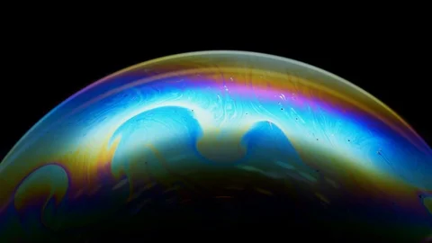 Close-up of soap bubble. Multicolored rainbow iris like colorful gas planet Stock Footage 125619893