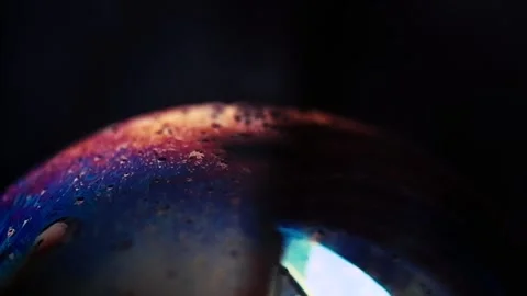 Close up of soap bubble texture surface in motion isolated on black Stock Footage 154629657