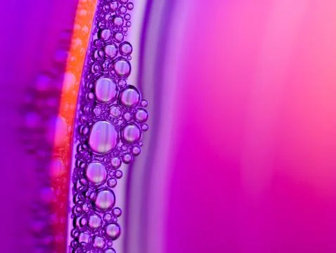 Close up soap bubble on water led light background Stock Photos
