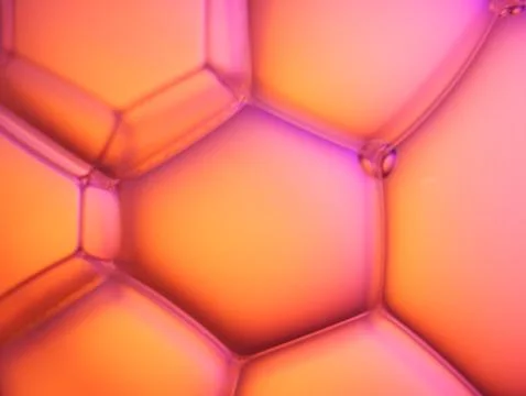Close up soap bubble on water led light background Stock Photos