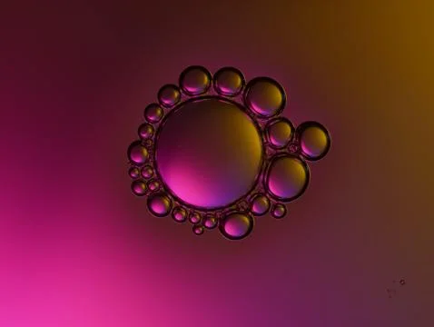 Close up soap bubble on water led light background Stock Photos