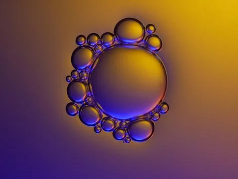 Close up soap bubble on water led light background Stock Photos
