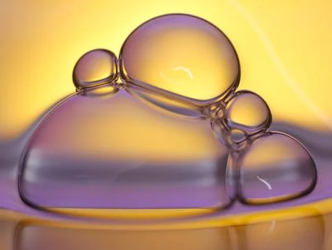 Close up soap bubble on water led light background Stock Photos