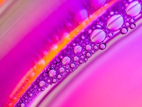 Close up soap bubble on water led light background Stock Photos