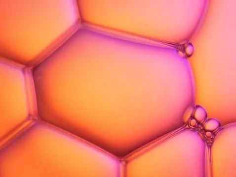 Close up soap bubble on water led light background Stock Photos