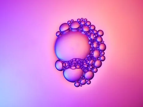 Close up soap bubble on water led light background Stock Photos