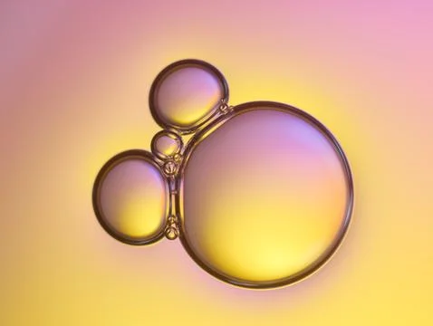 Close up soap bubble on water led light background Stock Photos