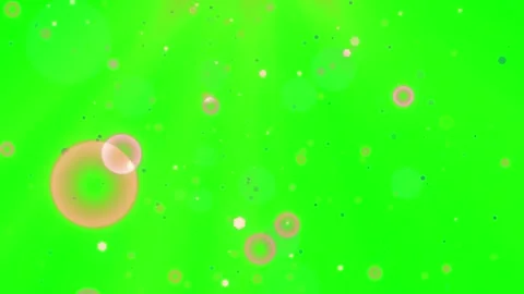 Close-up of soap bubbles floating on vibrant green liquid background with light Stock Footage 343807825