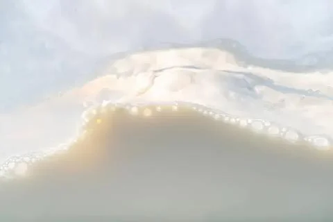 Close-up of soap bubbles forming on a soap film Stock Photos