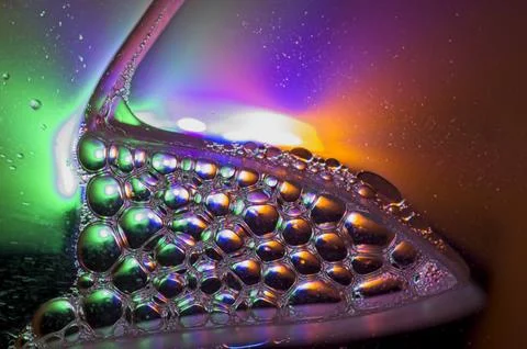 Close up of soap bubbles that resemble a microscopic view of a molecule or eg Stock Photos