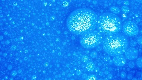 Close up of soap bubbles in water. abstract background for cleaning liquid ads Stock Footage 340906392