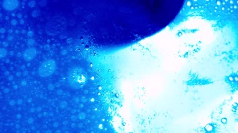 Close up of soap bubbles in water. abstract background for cleaning liquid ads Stock Footage 340910647