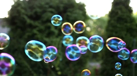 Close up of soap colorful bubbles floating in the air Stock Footage 53483463