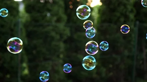 Close up of soap colorful bubbles floating in the air Stock Footage 55286845