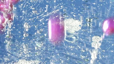 Close-up soap foam texture with pink gel balls, white shampoo soapsud background Stock Footage 309360687