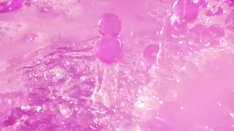 Close-up soap foam texture with pink gel balls, white shampoo soapsud background Stock Footage 310670789