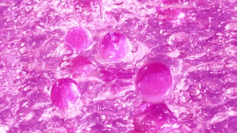 Close-up soap foam texture with pink gel balls, white shampoo soapsud background Stock Footage 318572976