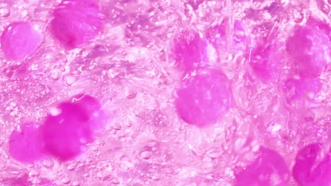 Close-up soap foam texture with pink gel balls, white shampoo soapsud background Stock Footage 320515998