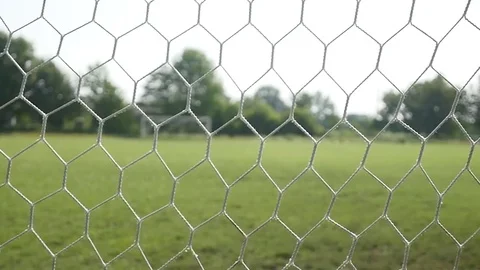 Close up of a soccer ball hitting a net 動画素材 77718026
