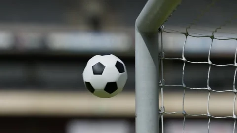 Close-up of a soccer ball hitting the post Видео 330160773
