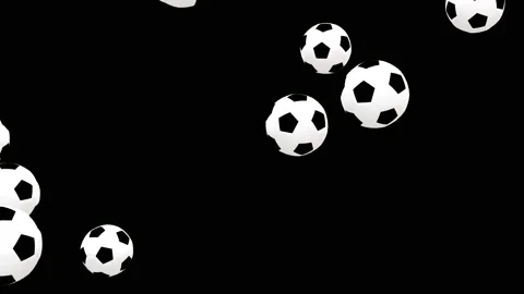 Close-up of the soccer balls falling on black floor with alpha matte. Stock Footage 151294719