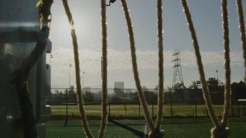 Close-up of Soccer Net Bungees on a net on a field Stock Footage 114644638