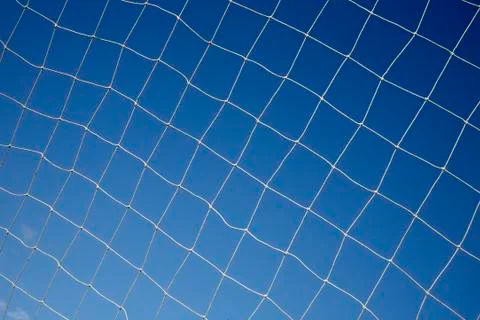 Close up of a soccer net. Photos