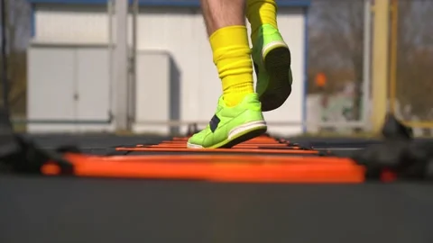 Close-up of Soccer Player Doing Dynamic Warm Up For Football Stock Footage 152081576