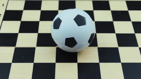 Close up a soccerball on chessboard Stock Footage 78738351