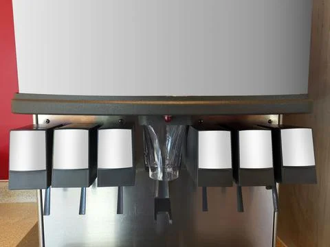 Close up soda beverage machine on fast food restaurant Stock Photos