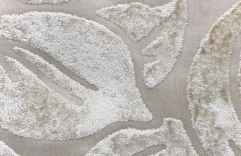 Close up of soft beige plush textile with raised texture Stock Photos