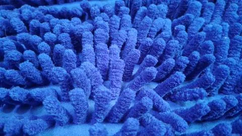 Close up of a soft blue fabric bath mat texture Stock Photos