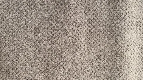 Close-up of Soft Grey Microfiber Fabric Texture with Detailed Fiber Patterns Stock Footage 340898293