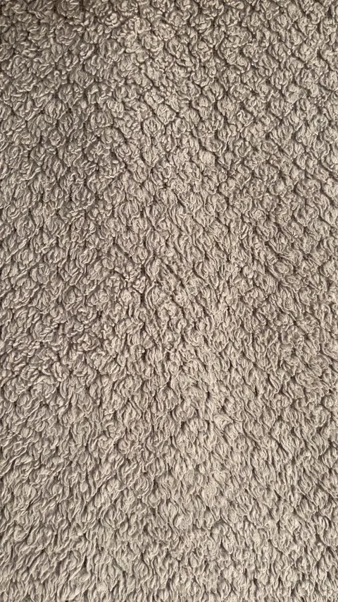 Close-up of Soft Grey Microfiber Fabric Texture with Detailed Fiber Patterns Stock Footage 340898359