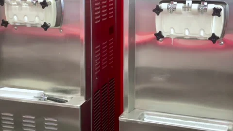 Close up of a soft serve ice cream machine Stock Footage 338171237