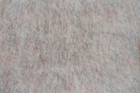Close up of soft wool blend fabric with fuzzy beige texture and natural fibers Stock Photos