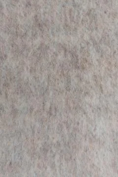 Close up of soft wool blend fabric with fuzzy beige texture and natural fibers Stock Photos