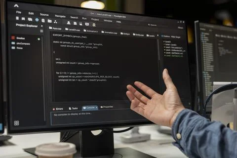 Close up of software developer coding on PC in startup office Foto stock
