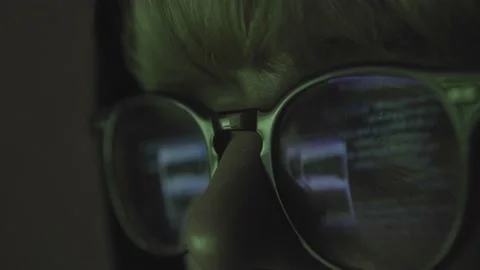 Close up of Software Developer Hacker wearing Glasses Working on Computer, Code  Stock Footage 150426538