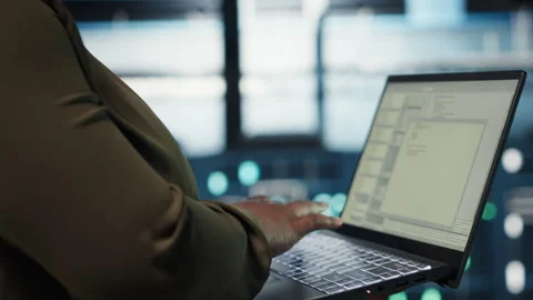 Close up of software developer working in data center to optimize network Stock Footage 317125064