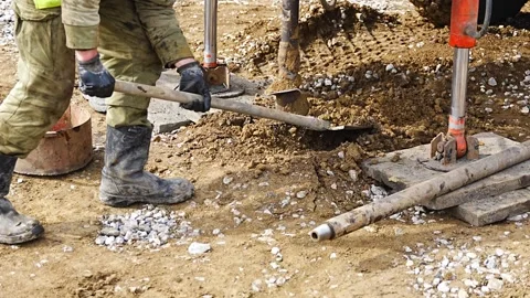 Close-up of soil sampling during pile drilling process. Extraction of subsurface Stock Footage 312671394